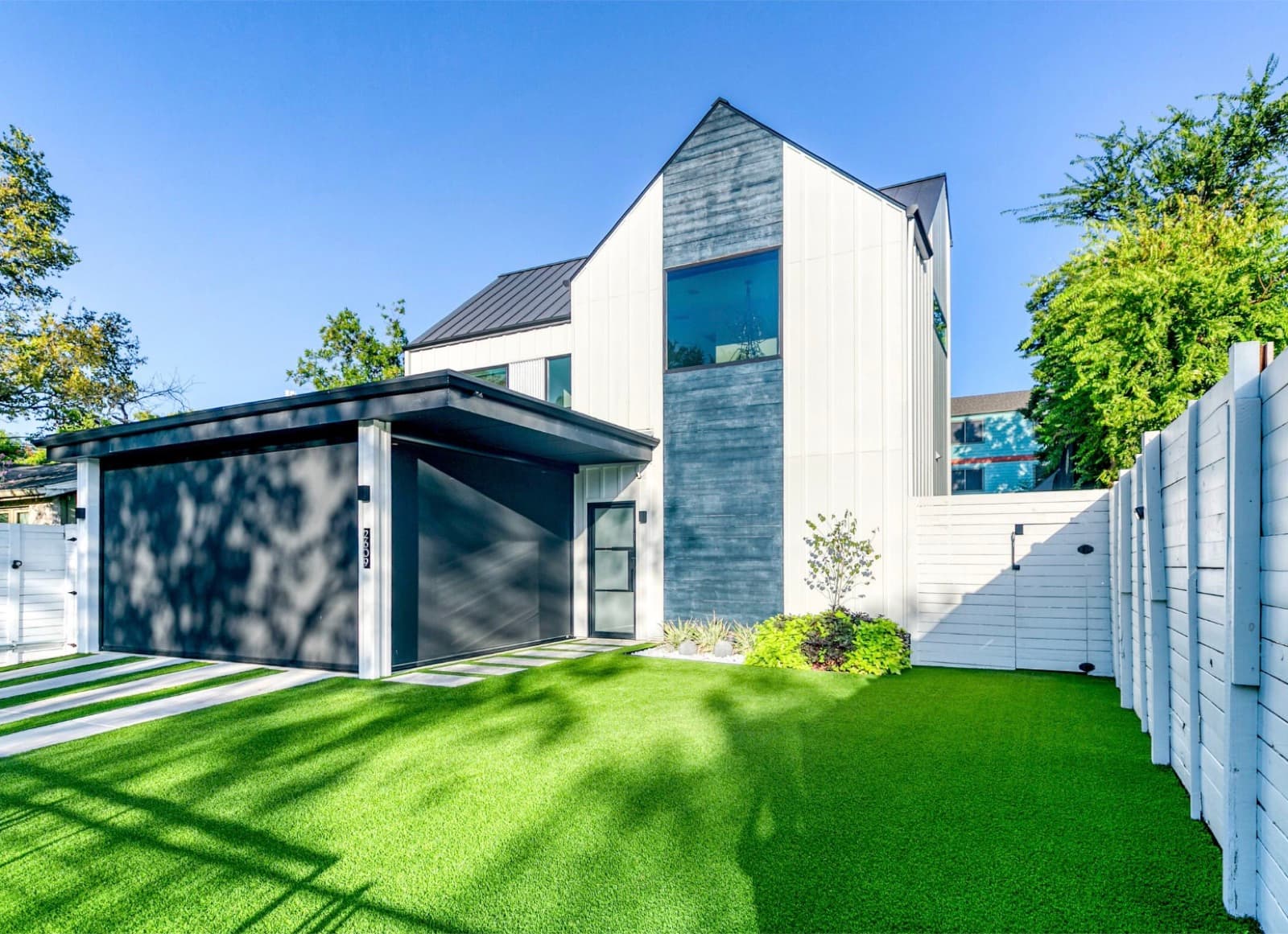 A modern two-storey home in Austin, Texas on a clear day